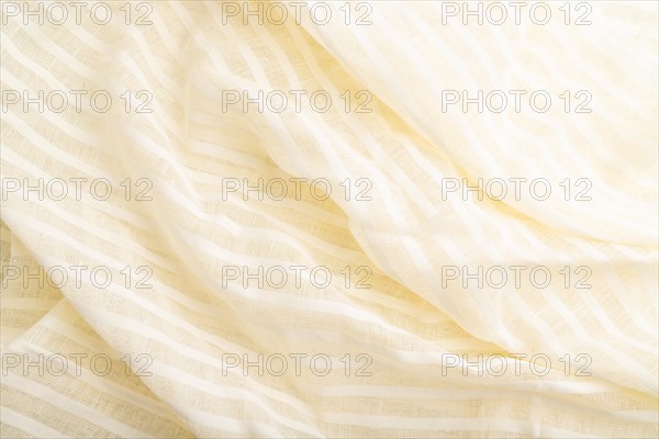 Fragment of white linen tissue. Top view, flat lay, natural textile background and texture. wave concept, abstract