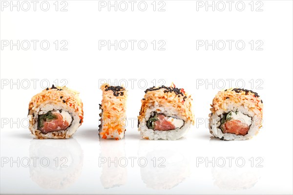 Four Japanese maki sushi rolls in a row with salmon, sesame and cream cheese isolated on white background.Side view, close up