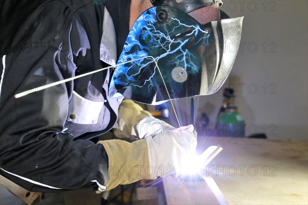 Metal worker during welding work