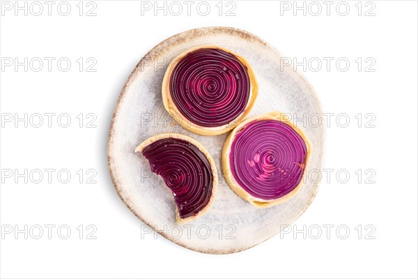 Sweet tartlets with jelly and milk cream isolated on white background. top view, flat lay, close up