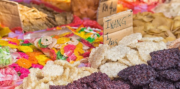 Chinese and Asian food on the market, rice, chips, noodles, sweets