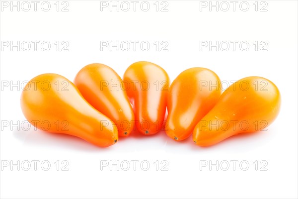 Five small ripe orange grape tomatoes isolated on white background. side view, close up