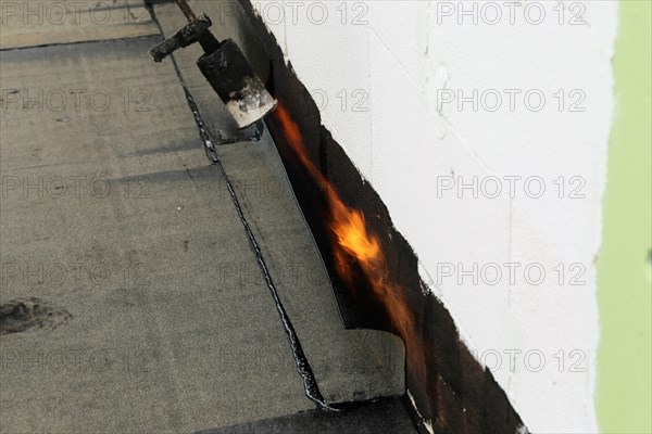 Professional flat roof waterproofing with bitumen welding membranes