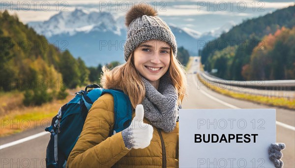 AI generated, human, humans, person, persons, woman, woman, one person, 20, 25, years, outdoor, seasons, cap, bobble hat, gloves, winter jacket, cold, cold, backpack, woman wants to travel, hitchhiking, hitchhiking, hitchhiking, road, motorway, sign saying Budapest