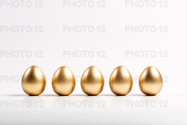 Five golden easter eggs on white background. KI generiert, generiert AI generated