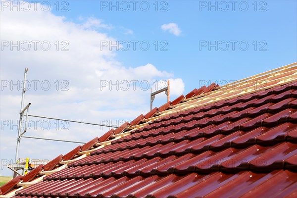 Roofing work, re-roofing of a tiled roof