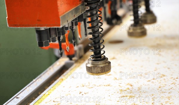 Automatic drilling machine or hole line drilling machine as used in a cabinet maker's workshop