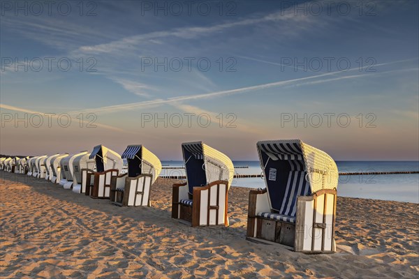 Beach chairs set up in the morning sun on Zingst beach