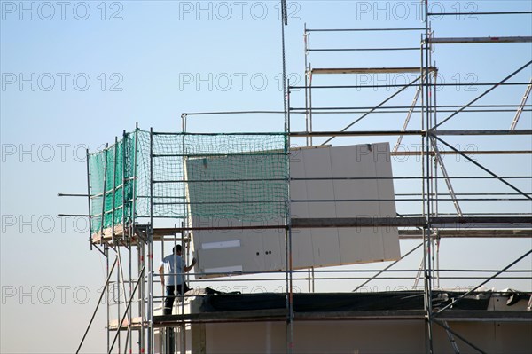 Prefabricated house under construction, the exterior walls are being delivered (Bad Duerkheim, Rhineland-Palatinate)