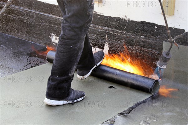 Professional flat roof waterproofing with bitumen welding membranes