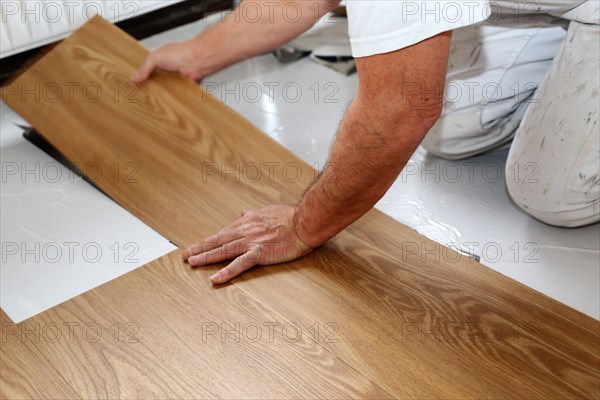 Professional installation of vinyl flooring or PVZ flooring