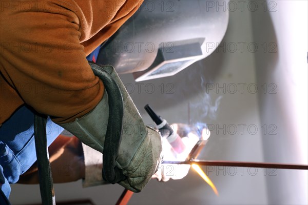 Metal worker during welding work