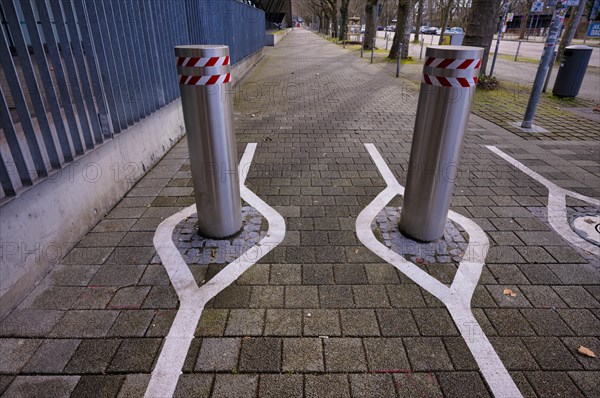 Automatic bollards, with white markings for smartphone junkies, Stuttgart, Baden-Wuerttemberg, Germany, Europe