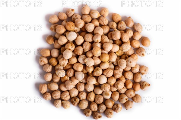 Pile of red lentils isolated on white background. Top view