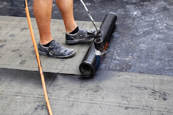 Professional flat roof waterproofing with bitumen welding membranes