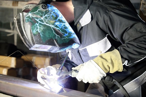 Metal worker during welding work