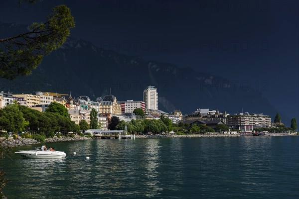 Lake Geneva promenade, thunderstorm, summer, rain, dramatic, dark sky, weather, palm tree, climate, travel, holiday, Alps, Montreux, Vaud, Switzerland, Europe