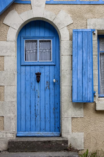 Old house facade with blue door and blue window, Ile de Brehat, Brittany, France, Europe