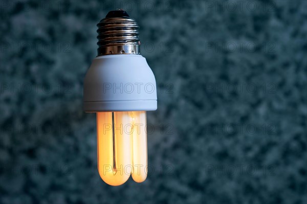 Warm light of a luminous energy-saving lamp