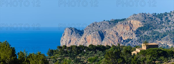 View over a Mediterranean landscape with mountains in the background and the sea in the distance, Majorca