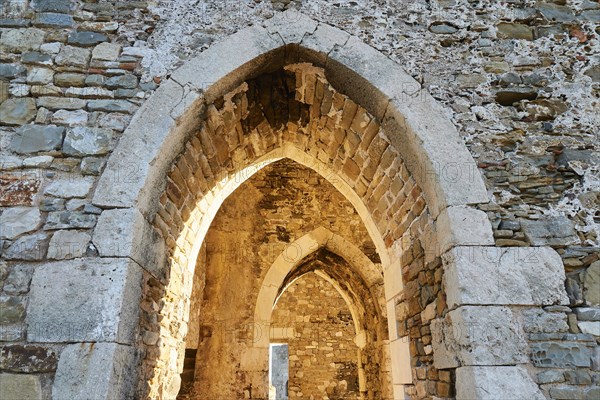 Close-up of a historic stone arch with visible texture and details of the wall, sea fortress Methoni, Peloponnese, Greece, Europe