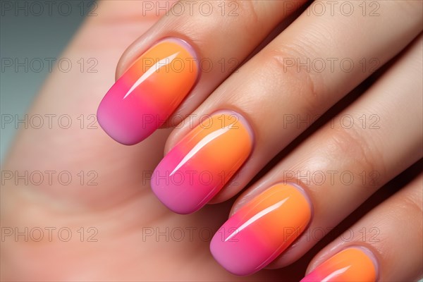 Close up of woman's fingernails with ombre pink and orange nail art design. KI generiert, generiert AI generated