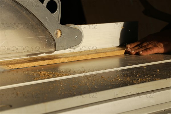 Carpenter at work in his carpentry workshop