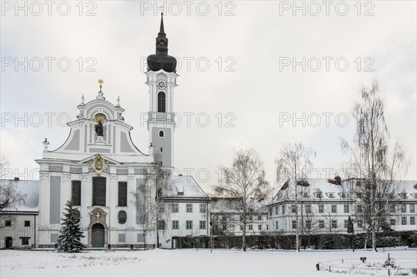 Snow-covered baroque church in winter, Marienmuenster, Diessen, Ammersee, Fuenfseenland, Pfaffenwinkel, Upper Bavaria, Bavaria, Germany, Europe