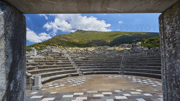 View through an arched entrance to the ruins of an ancient theatre, sanctuary of Asclepius, Ekklesiasterion, meeting place of the citizens, archaeological site, Ancient Messene, capital of Messinia, Messini, Peloponnese, Greece, Europe