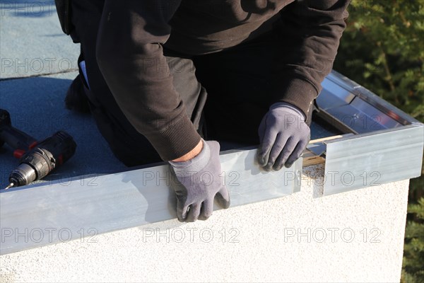 Tinsmith work on a flat roof