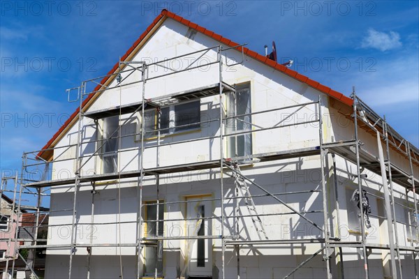 Thermal insulation of a house facade