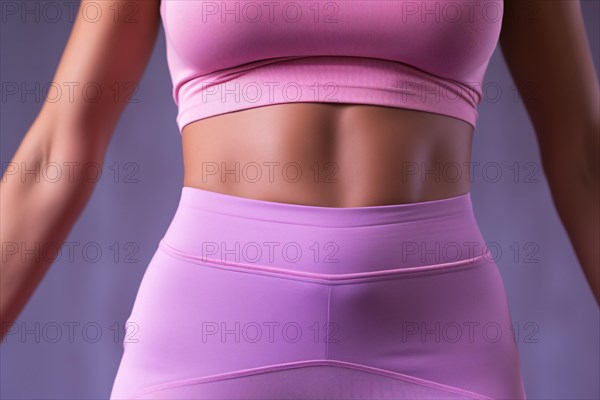 Close up of woman's toned waist in sport clothes. KI generiert, generiert AI generated