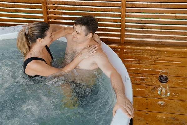 Happy couple in love spending vacation together, enjoying spa and privacy