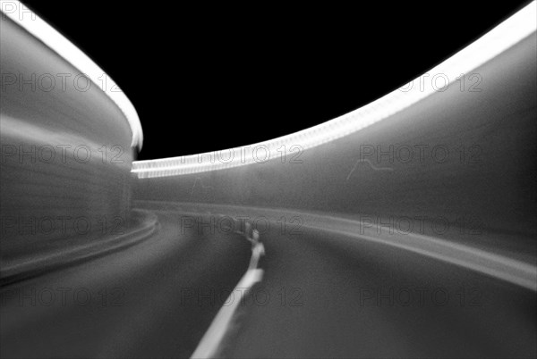 Car tunnel view seen out of a car, motion blur