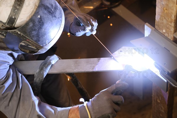 Metal worker during welding work