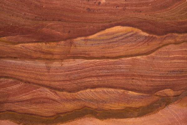 Natural texture of red rocks. Colored canyon, Egypt, desert, the Sinai Peninsula, Nuweiba, Dahab, Africa