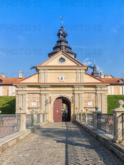 Ancient restored castle with a moat in the Nesvizh city. Belarus