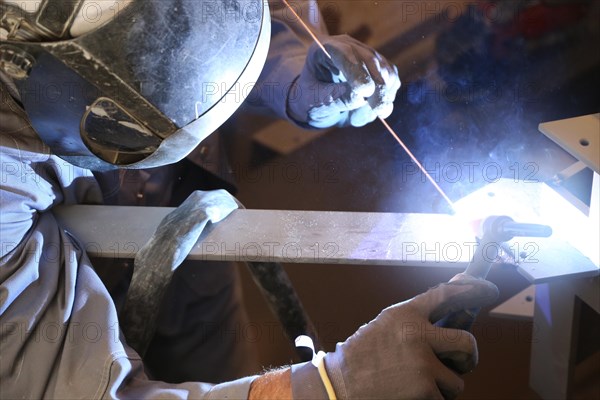 Metal worker during welding work