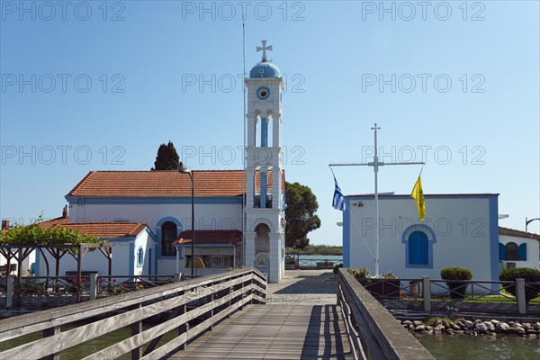 Church during the day with blue sky and access via a wooden bridge, Monastery of St Nicholas, Monastery of Agios Nikolaos, Agiou Nikolaou, Vistonidas Burma Lagoon, Porto Lagos, Xanthi, Eastern Macedonia and Thrace, Greece, Europe