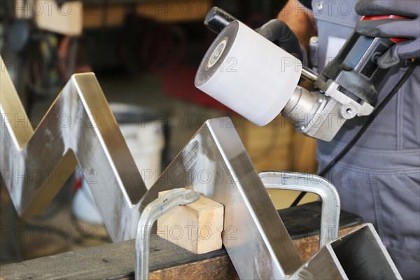 Labourer in the locksmith's shop