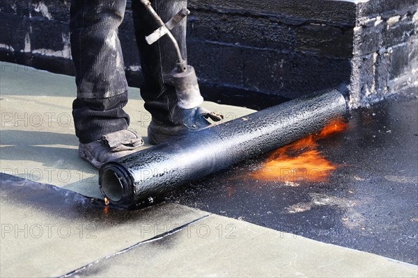 Professional flat roof waterproofing with bitumen welding membranes