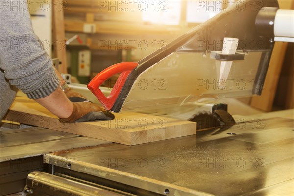 Carpenter at work in his carpentry workshop