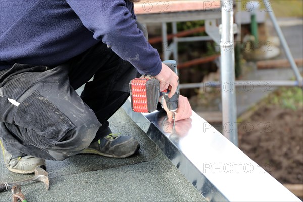 Tinsmith work on a flat roof