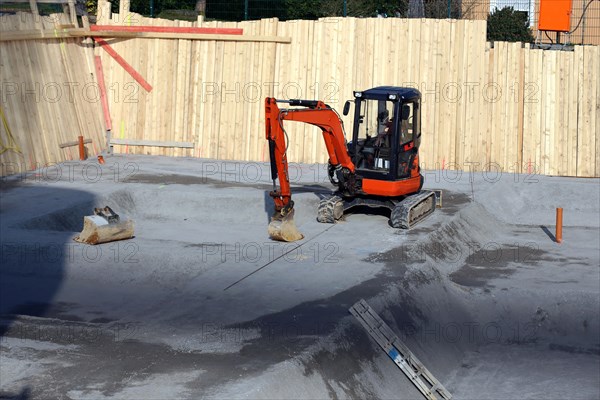 Basement excavation, building pit excavation on a large construction site in the new development area of Bad Duerkheim, Rhineland-Palatinate