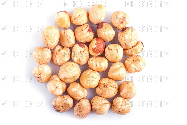 Pile of hazelnuts isolated on white background. Top view