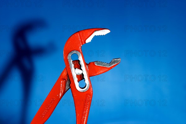 Open red Tongue-and-groove pliers