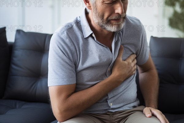 Man clutching chest. Concept for heart attack, chest pain or other heart deseases. KI generiert, generiert AI generated