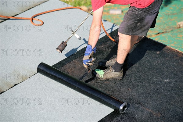 Professional flat roof waterproofing with bitumen welding membranes