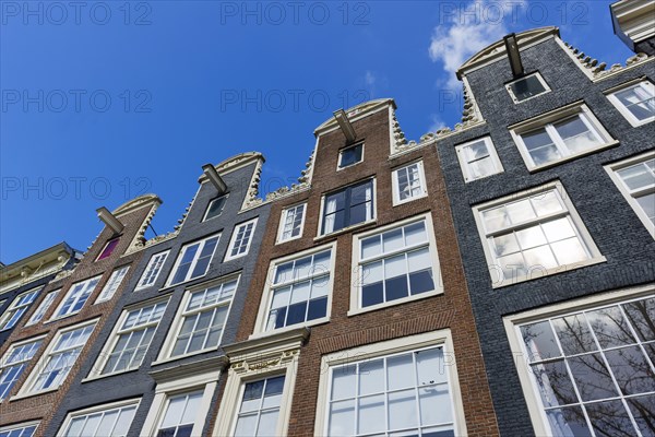 Row of houses with pulleys, architecture, Middle Ages, trade, trading city, warehouse district, facade, city centre, city trip, Amsterdam, Netherlands