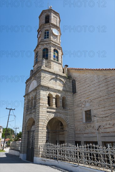 Stone church with tower clock under a clear blue sky, Greek Orthodox Church, Holy Church of Agios Georgios, Soufli, Eastern Macedonia and Thrace, Greece, Europe